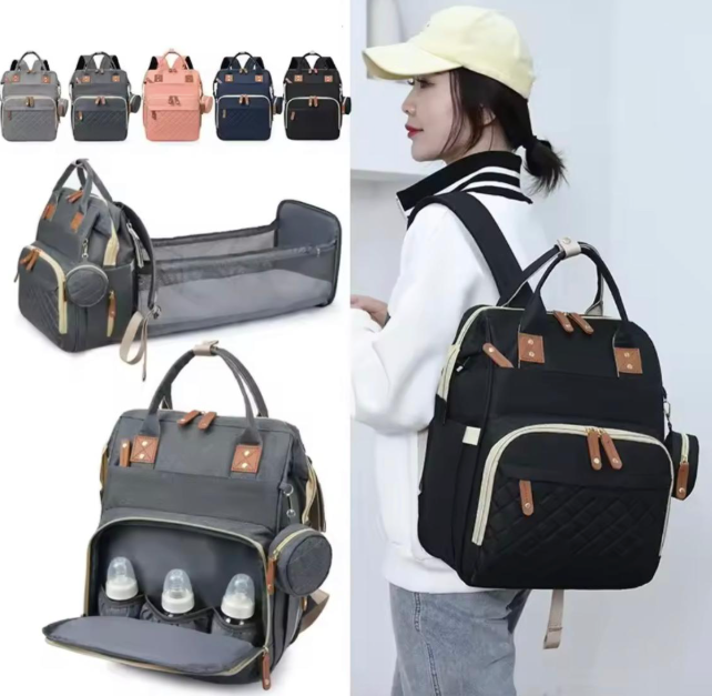 Pañalera con cambiador plegable y monedero - Diaper Bag™