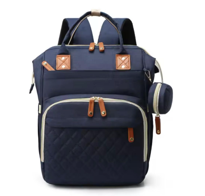 Pañalera con cambiador plegable y monedero - Diaper Bag™
